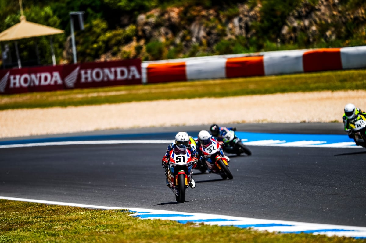 RIDER No. 51 Alfonsi Daquigan leads the pack through a tight corner, showing the world what Filipino racers are made of.