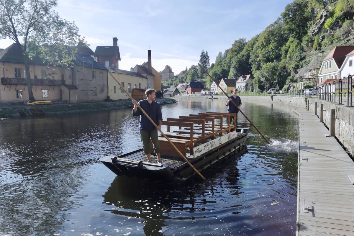 The Vltava River meanders around the village, vital to the transport of goods and enabling trade.