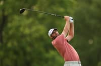 SCOTTIE Scheffler of the United States plays a shot from the 18th tee during the third round of the Memorial Tournament presented by Workday 2025 at Muirfield Village Golf Club on May 31, 2025 in Dublin, Ohio.