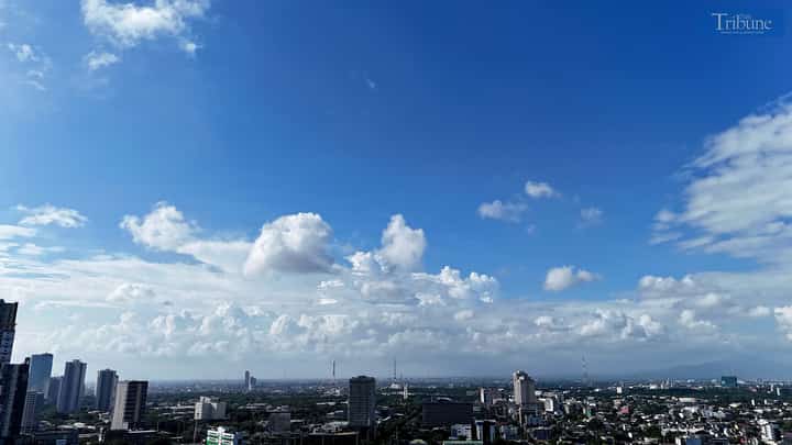 Blue skies with scattered clouds hover over Quezon City on Tuesday, despite PAGASA’s recent declaration of the start of the wet season in the Philippines.