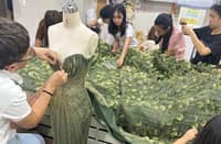 CJ Opiaza's iconic green gown