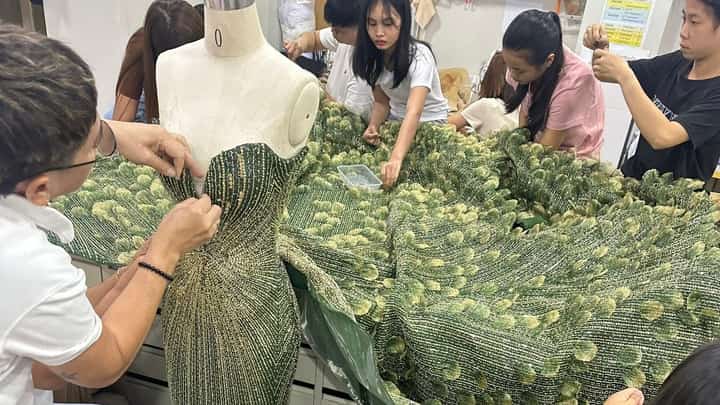 CJ Opiaza's iconic green gown
