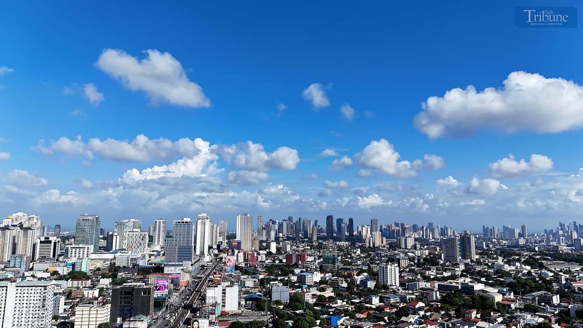 Blue skies with scattered clouds hover over Quezon City on Tuesday, despite PAGASA’s recent declaration of the start of the wet season in the Philippines.
