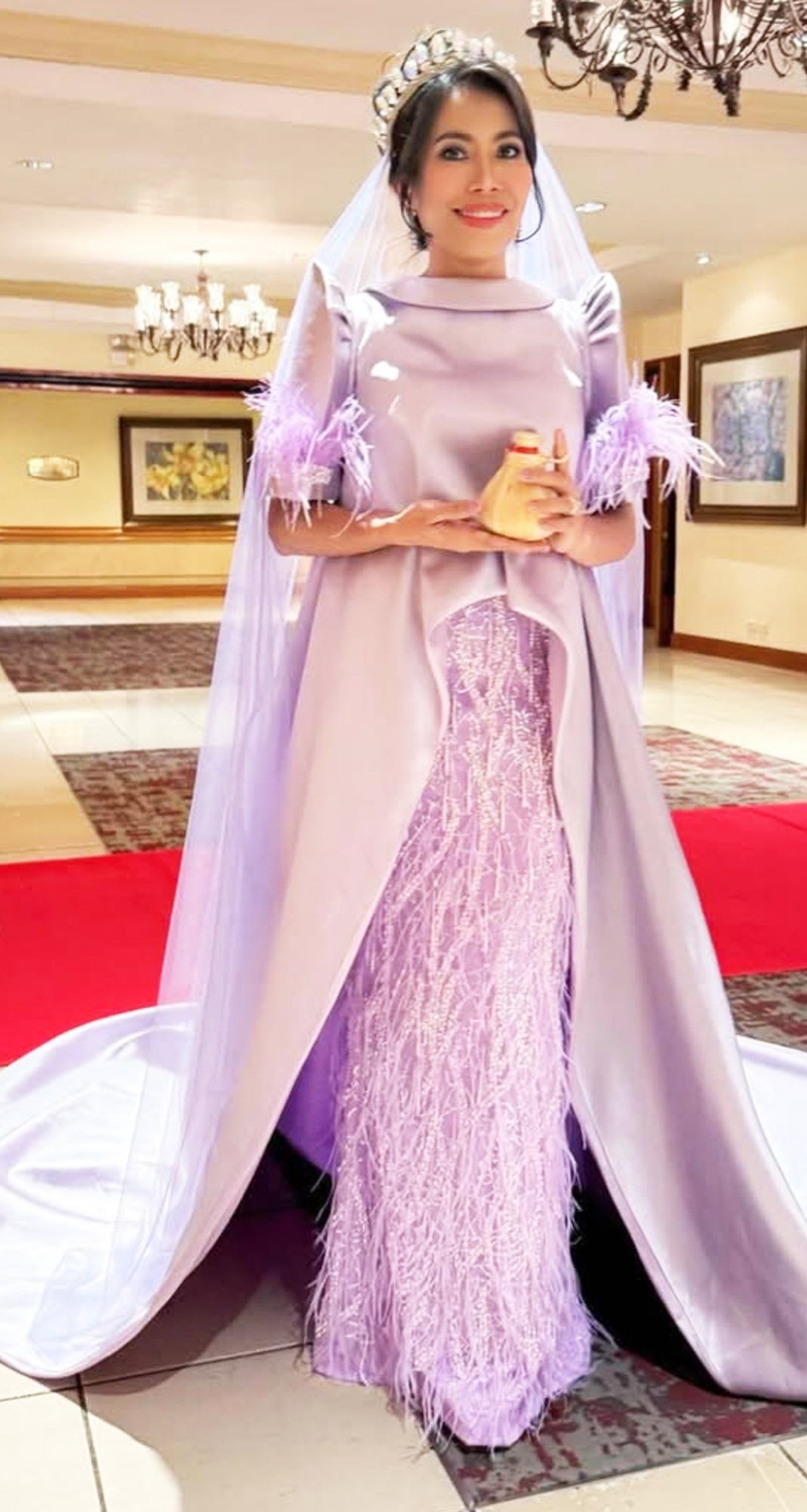 Irma Bitzer as Santa Maria Betania in a Danny Booc creation.