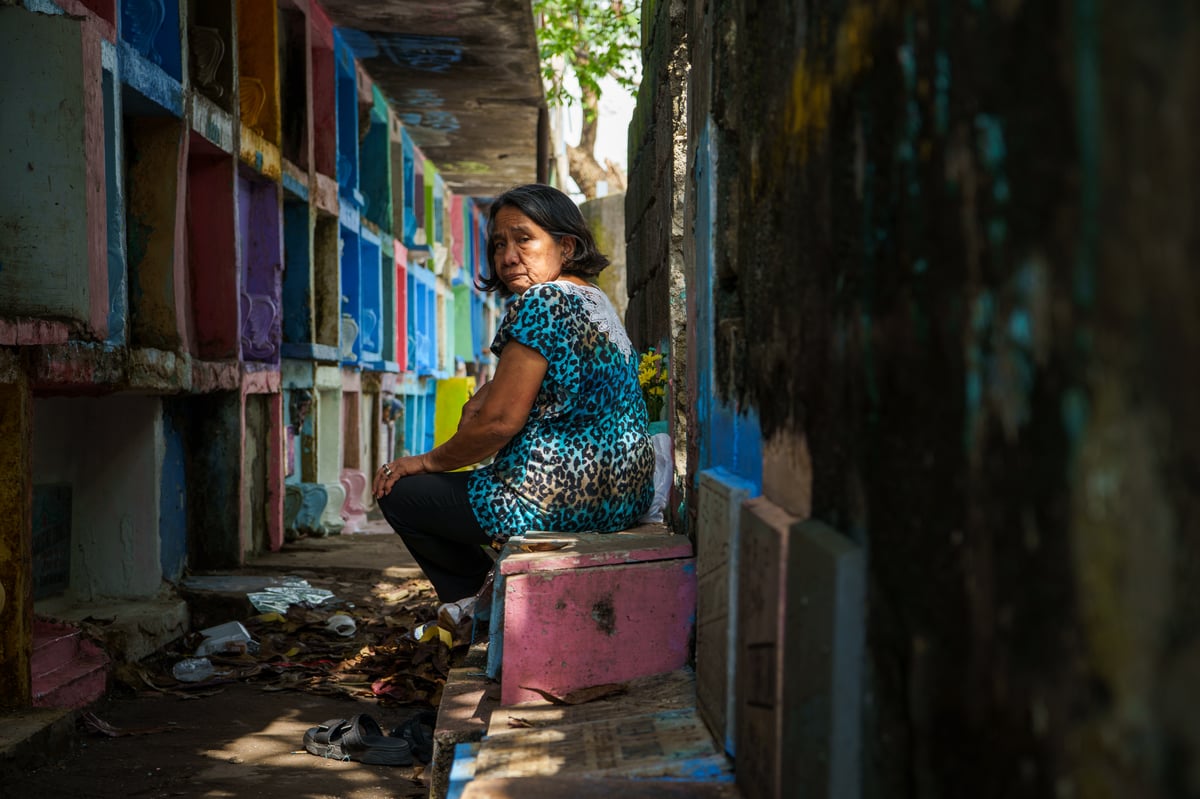 SY came across during Undas this woman at the Manila North Cemetery while she was involved on both a personal project and a work assignment.