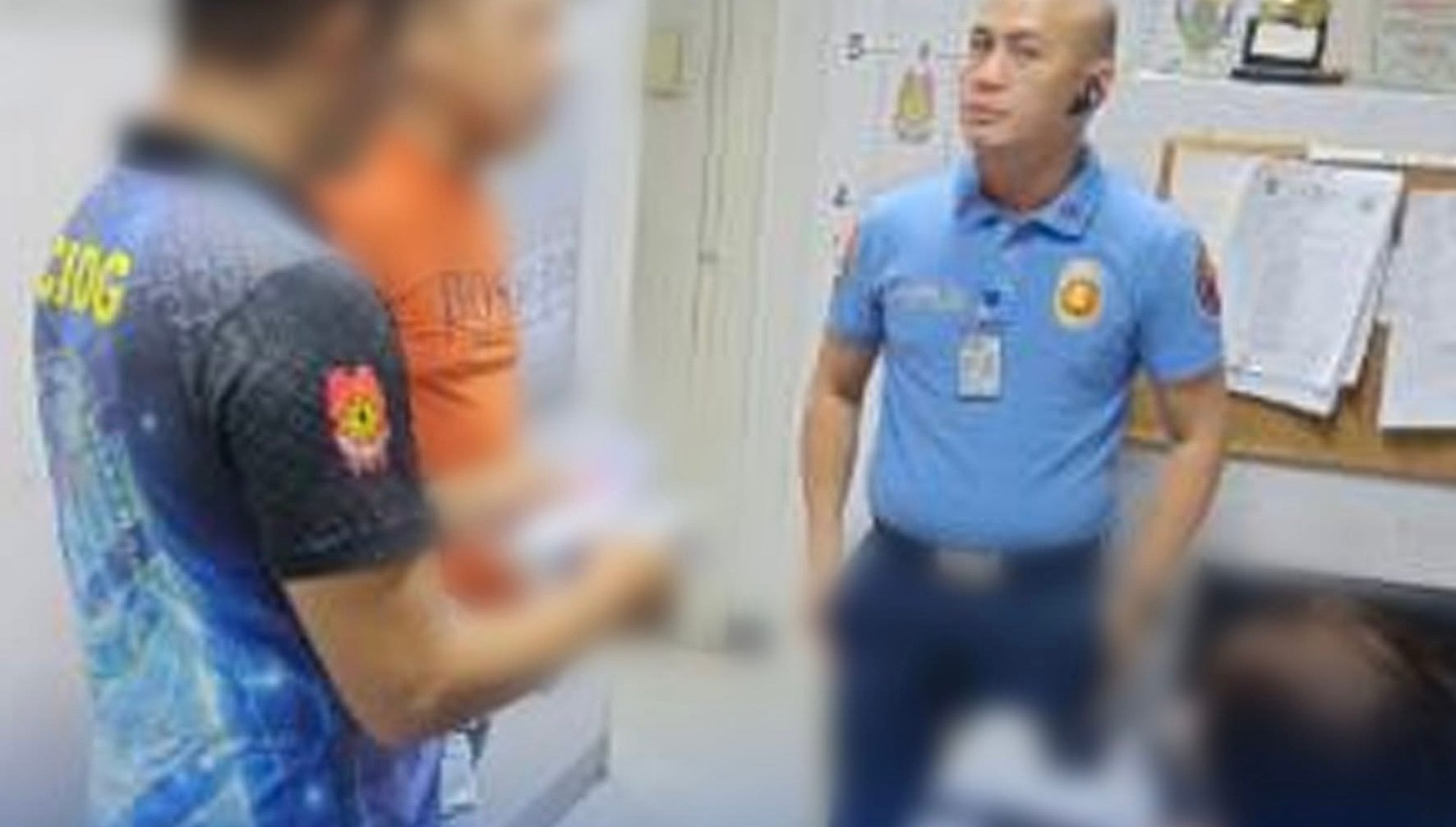 PHILIPPINE National Police -  Aviation Security Group personnel arrest a woman with an outstanding estafa warrant at NAIA Terminal 3.