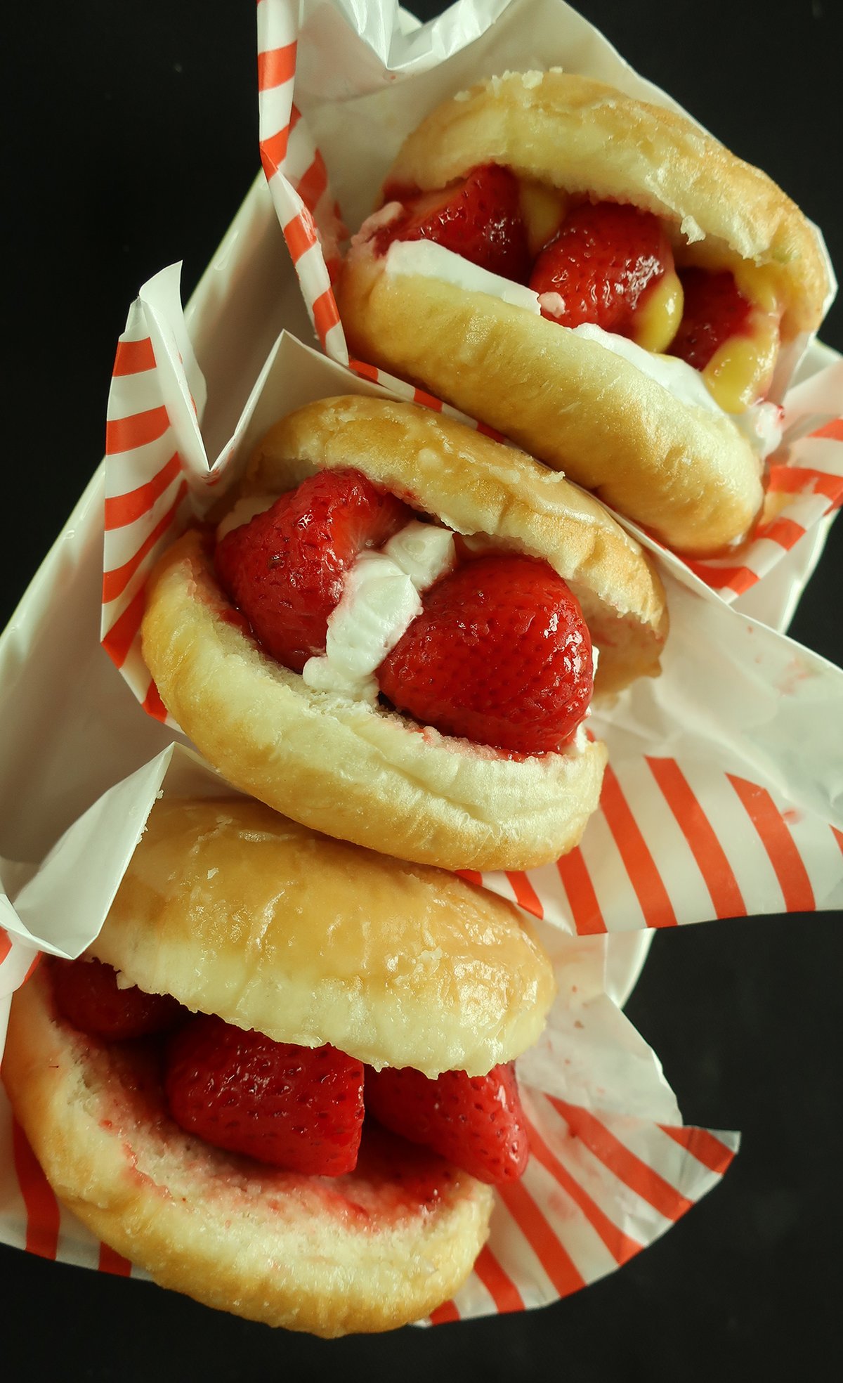 Classic Strawberry, Strawberry Lemon, and Strawberry Cream Cheese Donuts.