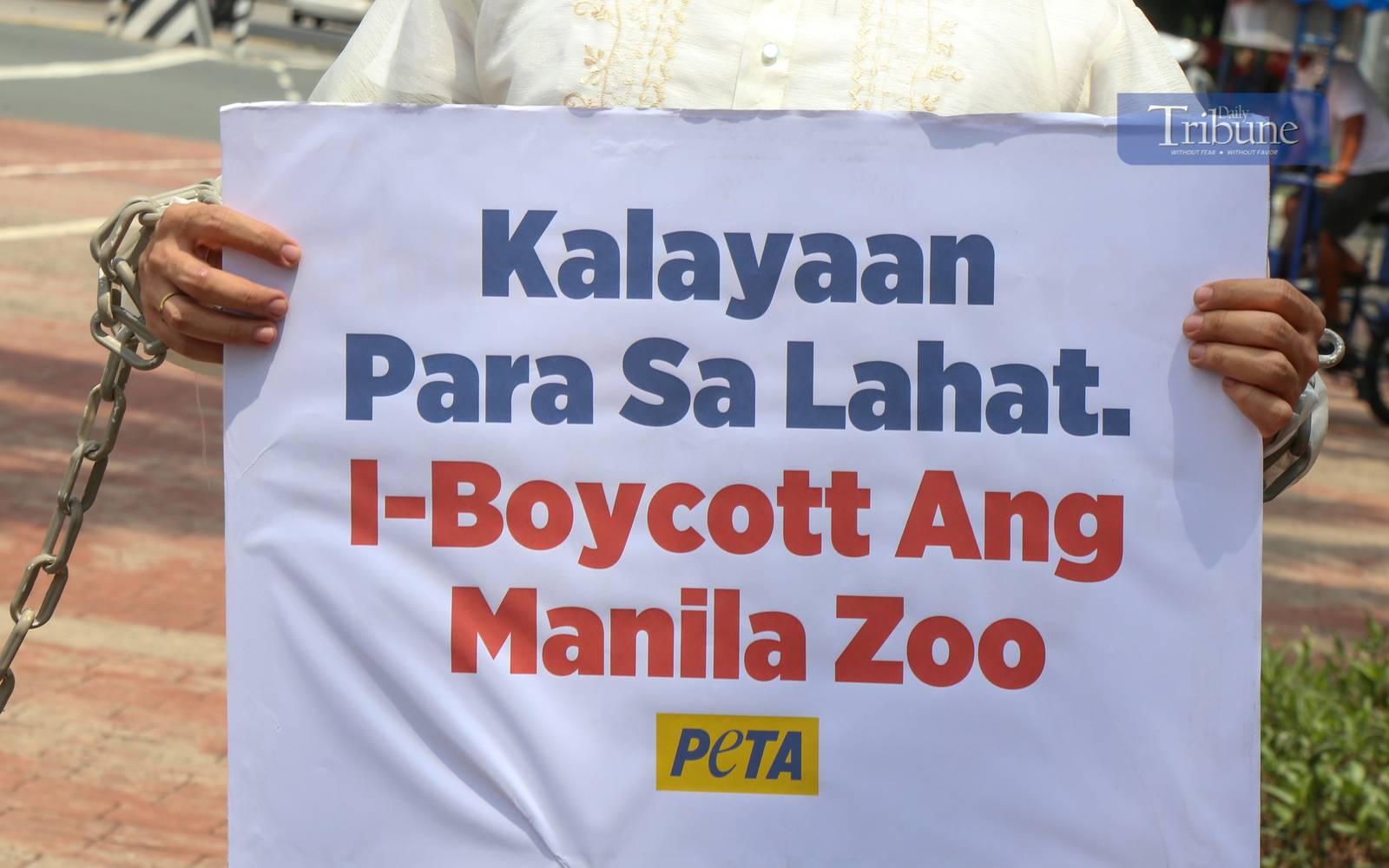 Animal rights advocates march at Luneta Park in Manila on 5 June 2025, ahead of Independence Day, urging the public to support their call to end the exploitation of wild animals in zoos. The group emphasized that animals in captivity are deprived of their natural habitats and behaviors.