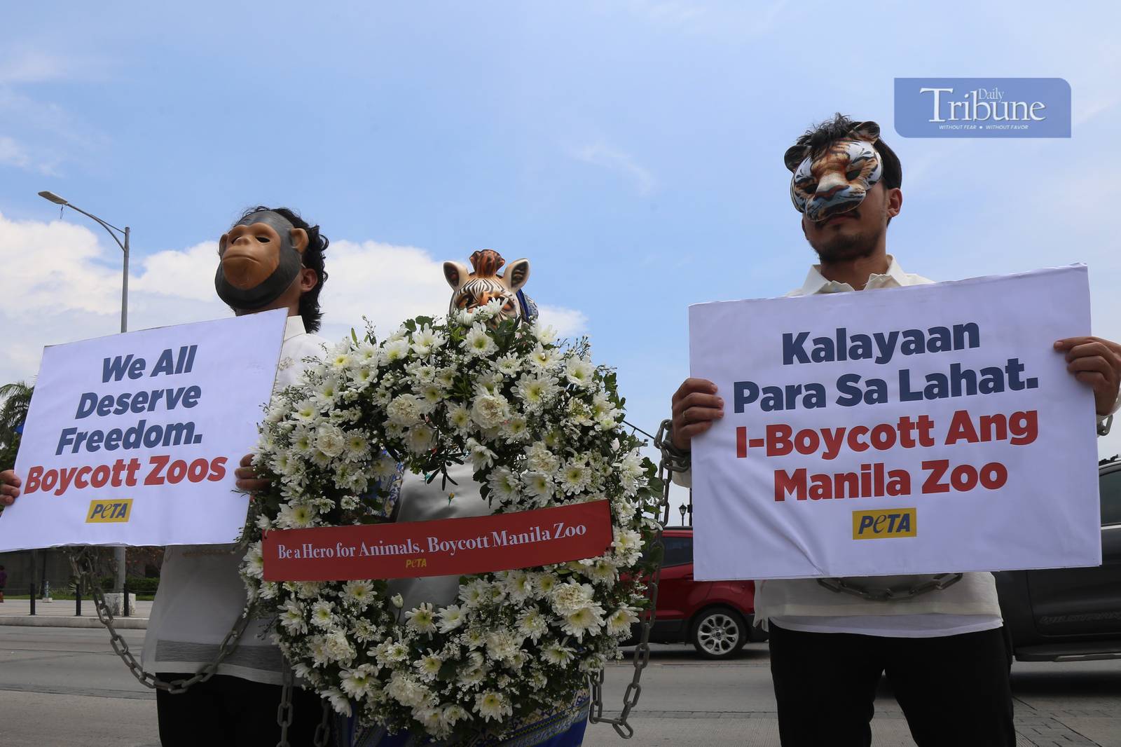 Animal rights advocates march at Luneta Park in Manila on 5 June 2025, ahead of Independence Day, urging the public to support their call to end the exploitation of wild animals in zoos. The group emphasized that animals in captivity are deprived of their natural habitats and behaviors.