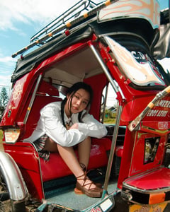 Bella Poarch rides tricycle in style