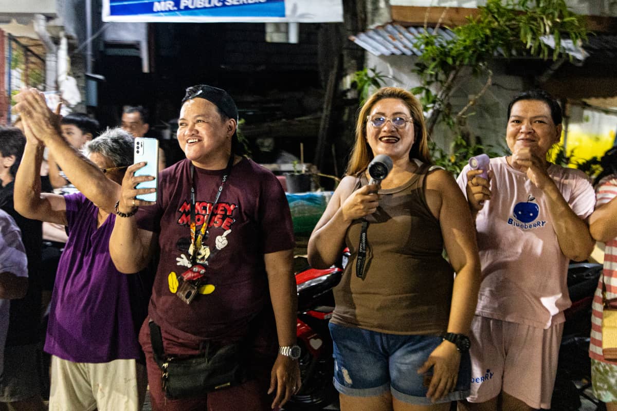 Crowd react as Reynas parade through the streets of Sampaloc, Manila on Sunday, 1 June 2025.