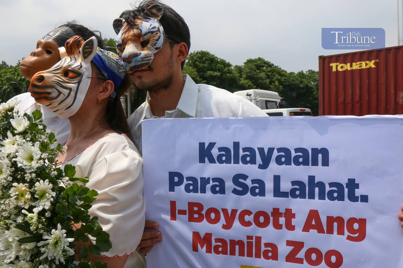 Animal rights advocates march at Luneta Park in Manila on 5 June 2025, ahead of Independence Day, urging the public to support their call to end the exploitation of wild animals in zoos. The group emphasized that animals in captivity are deprived of their natural habitats and behaviors.