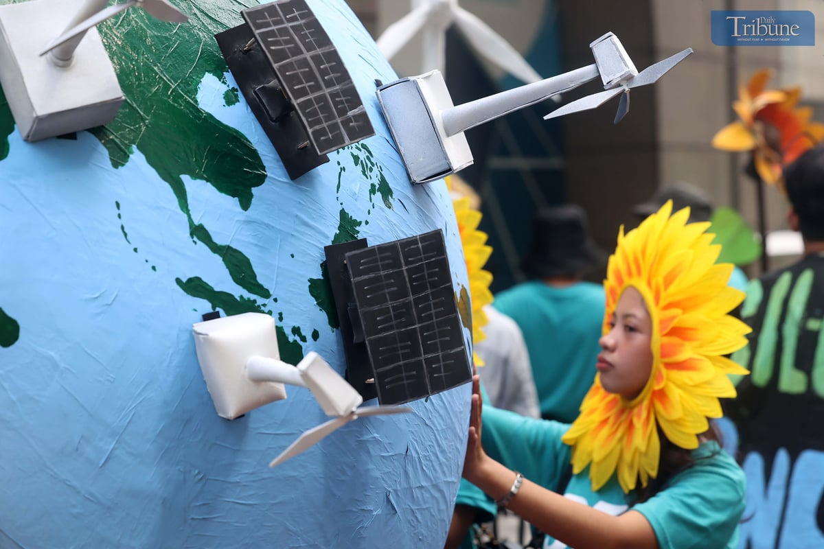 Environmental group 350 Pilipinas staged a creative protest outside the Asian Development Bank headquarters in Mandaluyong City on Thursday, calling for a just energy transition rooted in community-led solutions.
