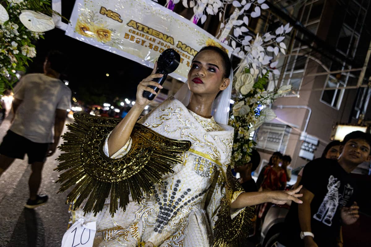 Gay Reynas interact with spectators during the Sagayla procession in Sampaloc, Manila on Sunday, 1 June 2025.