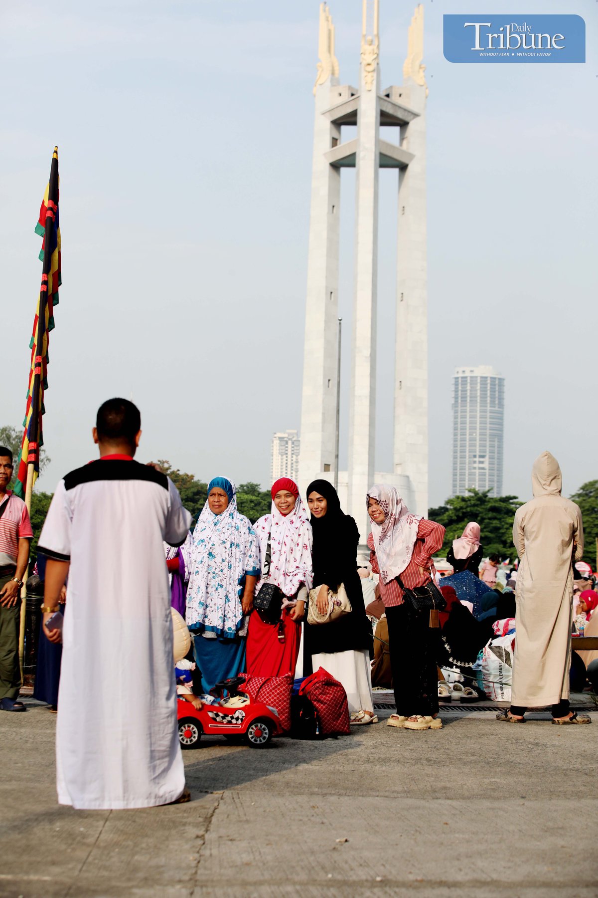 MUSLIM brothers and sisters take a selfie after offering prayers during the celebration of Eid al-Adha at Quezon Memorial Circle in Quezon City on Friday, 6 June 2025.