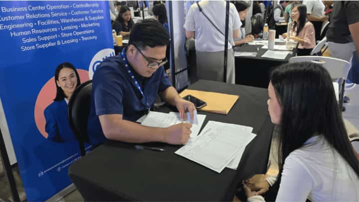 An applicant takes the first step in joining the country’s workforce at an SM job fair.