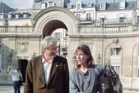 French director Bertrand Tavernier and French actress and singer Jane Birkin arrive at the Elysée Palace where they are received by the President of the Republic François Mitterrand before the 43rd Cannes Film Festival, on May 9, 1990.