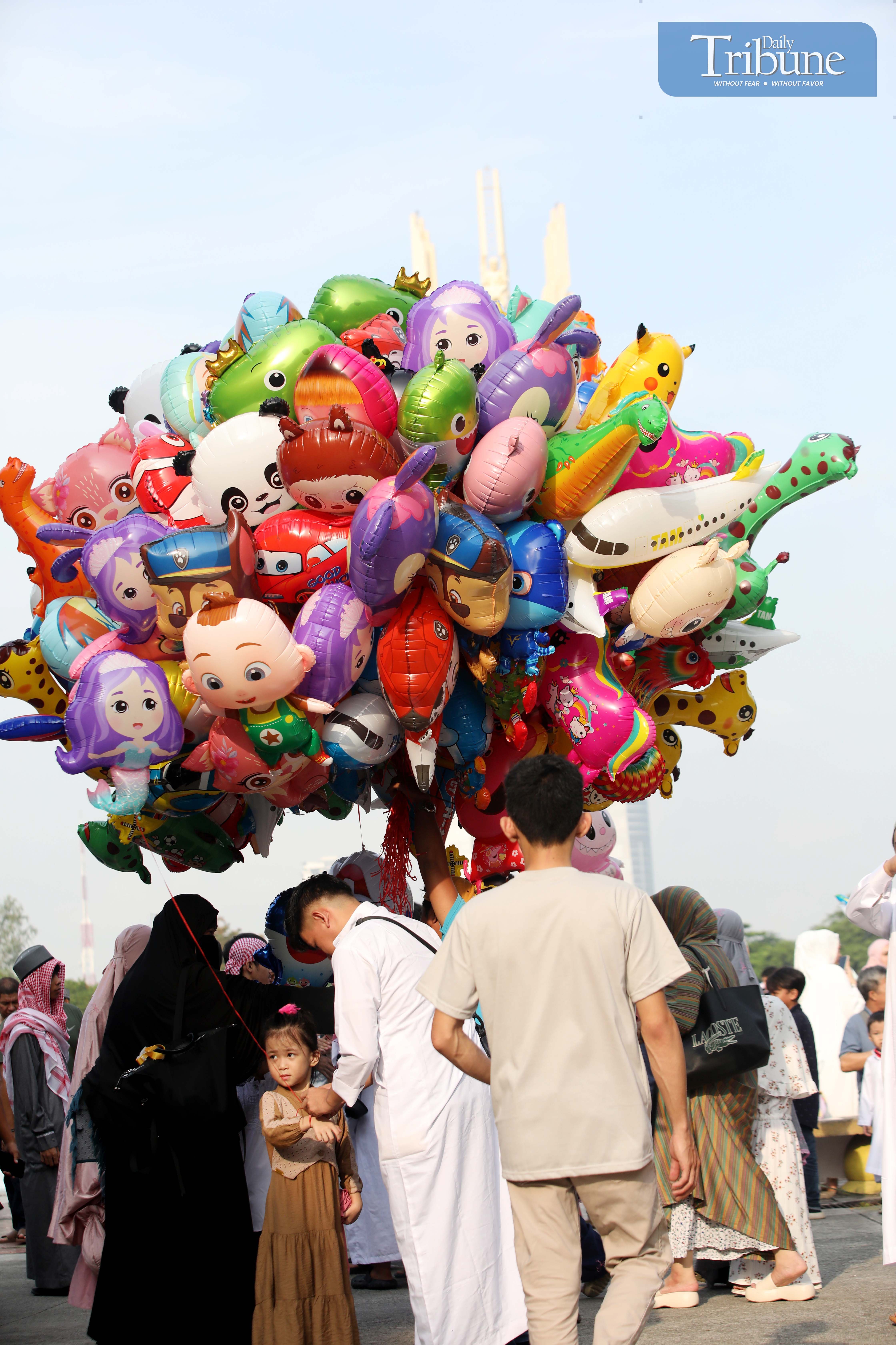 Eid al-Adha festivities bring smiles and balloons