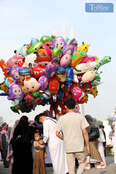 Eid al-Adha festivities bring smiles and balloons