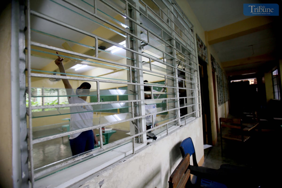 Teachers, volunteers, and students clean and repaint classrooms and collect recyclable materials at Quezon City High School on Saturday, 7 June 2025, during a special Brigada Eskwela activity in preparation for the opening of the new school year on 16 June.