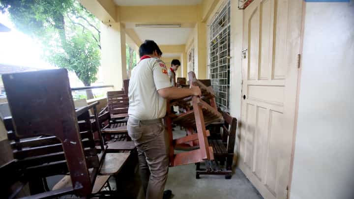 Teachers, volunteers, and students clean and repaint classrooms and collect recyclable materials at Quezon City High School on Saturday, 7 June 2025, during a special Brigada Eskwela activity in preparation for the opening of the new school year on 16 June.
