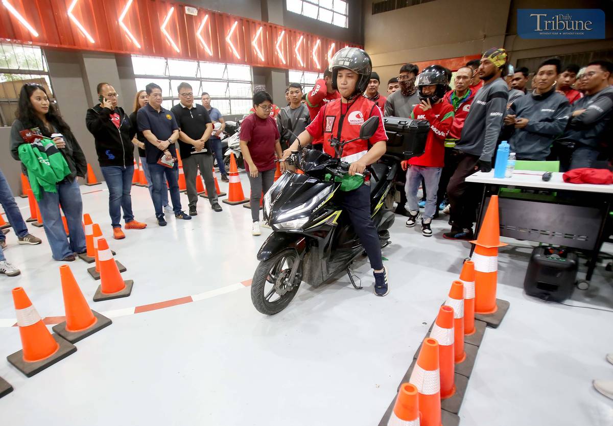 Metropolitan Manila Development Authority (MMDA) Chairman Atty. Don Artes, along with Traffic Discipline Office head Atty. Victor Nuñez and Special Operations Group Strike Force head Gabriel Go, inspects the MOVE IT and Grab facilities at the Asenso Center on A. Bonifacio Avenue, Barangka, Marikina City, on Saturday.