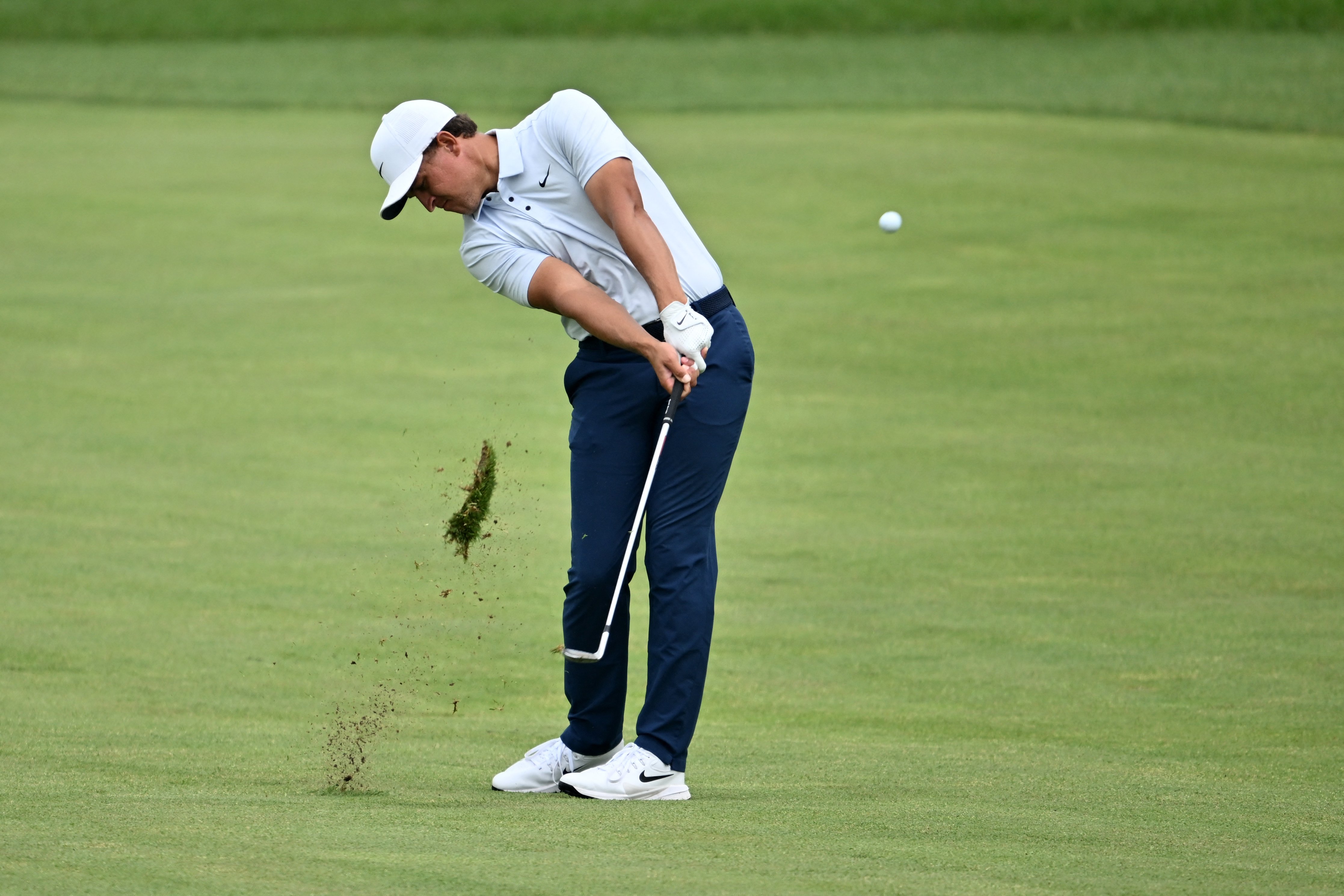 Champ leads Canadian Open as McIlroy crashes to missed cut