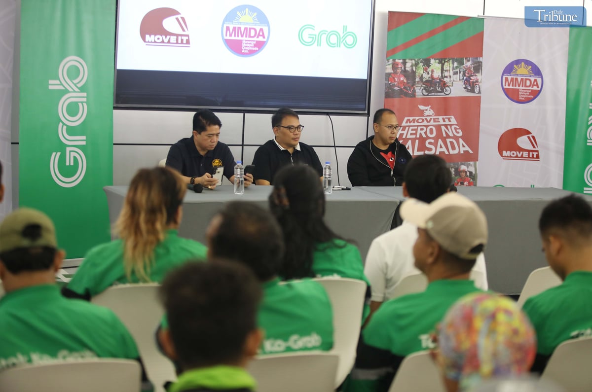 Metropolitan Manila Development Authority Chairman Don Artes, along with Traffic Discipline Office head Victor Nuñez and Special Operations Group Strike Force head Gabriel Go, speaks with MOVE IT and Grab drivers about the NCAP rules during a forum at the Asenso Center on A. Bonifacio Avenue, Barangka, Marikina City, on Saturday.