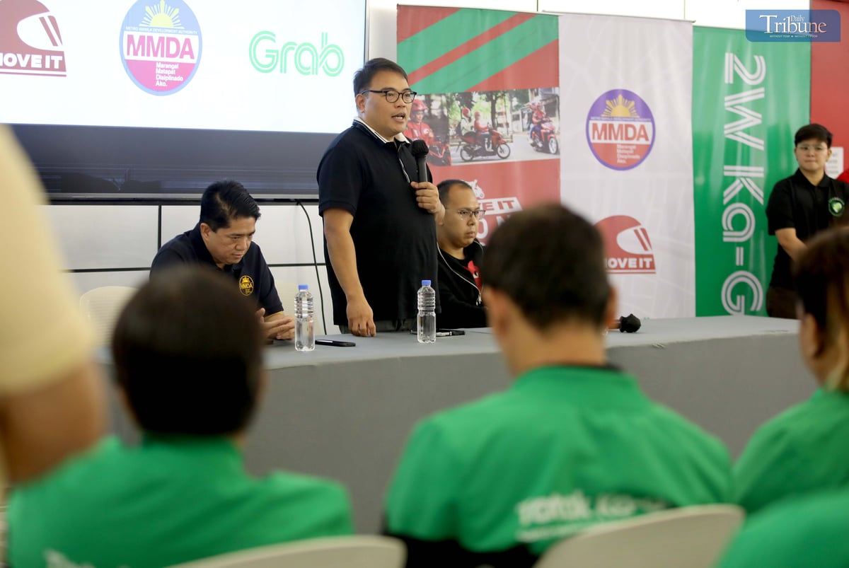 Metropolitan Manila Development Authority Chairman Don Artes, along with Traffic Discipline Office head Victor Nuñez and Special Operations Group Strike Force head Gabriel Go, speaks with MOVE IT and Grab drivers about the NCAP rules during a forum at the Asenso Center on A. Bonifacio Avenue, Barangka, Marikina City, on Saturday.