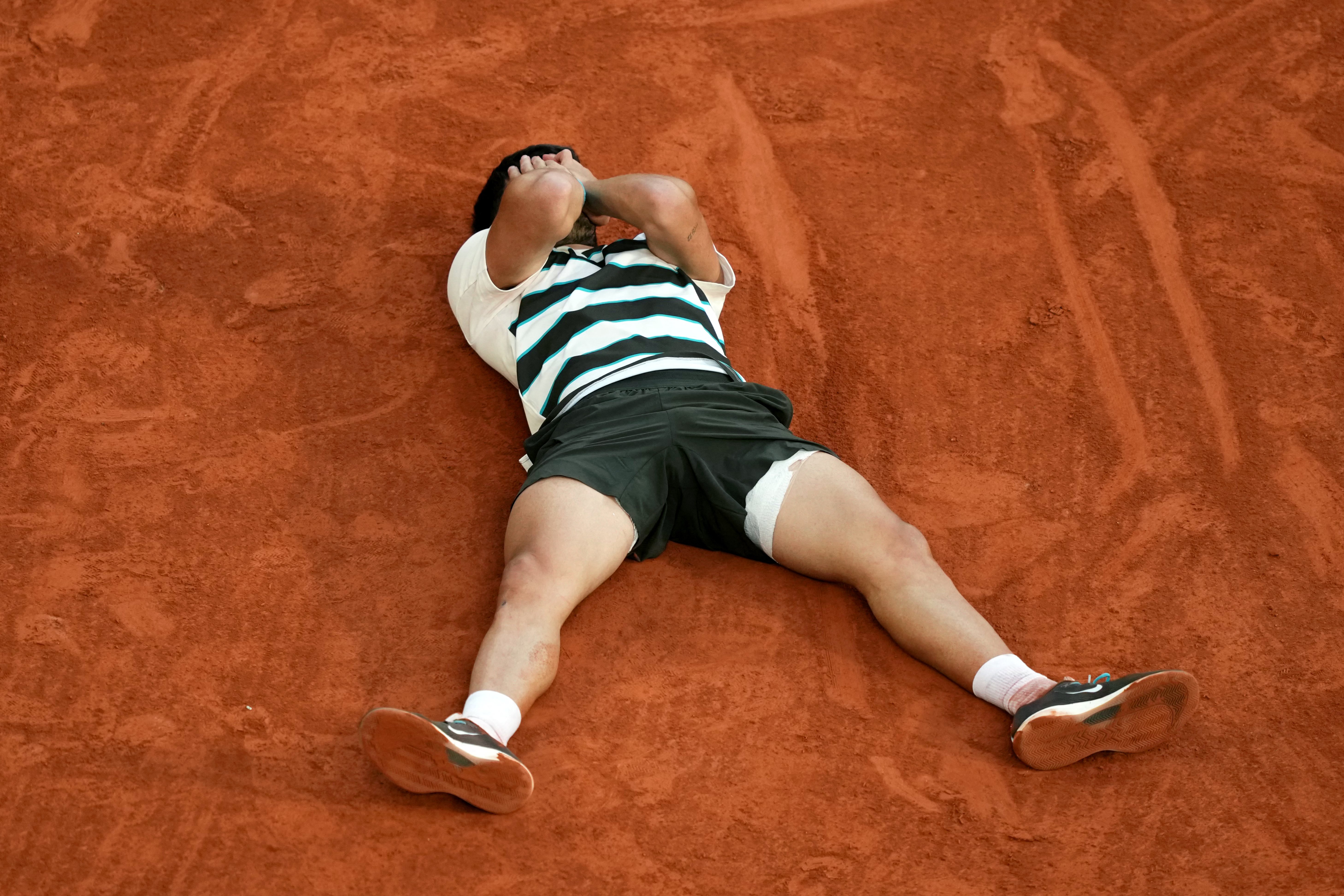 Alcaraz saves three match points to beat Sinner to French Open title