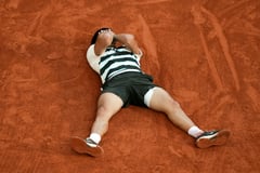Alcaraz saves three match points to beat Sinner to French Open title