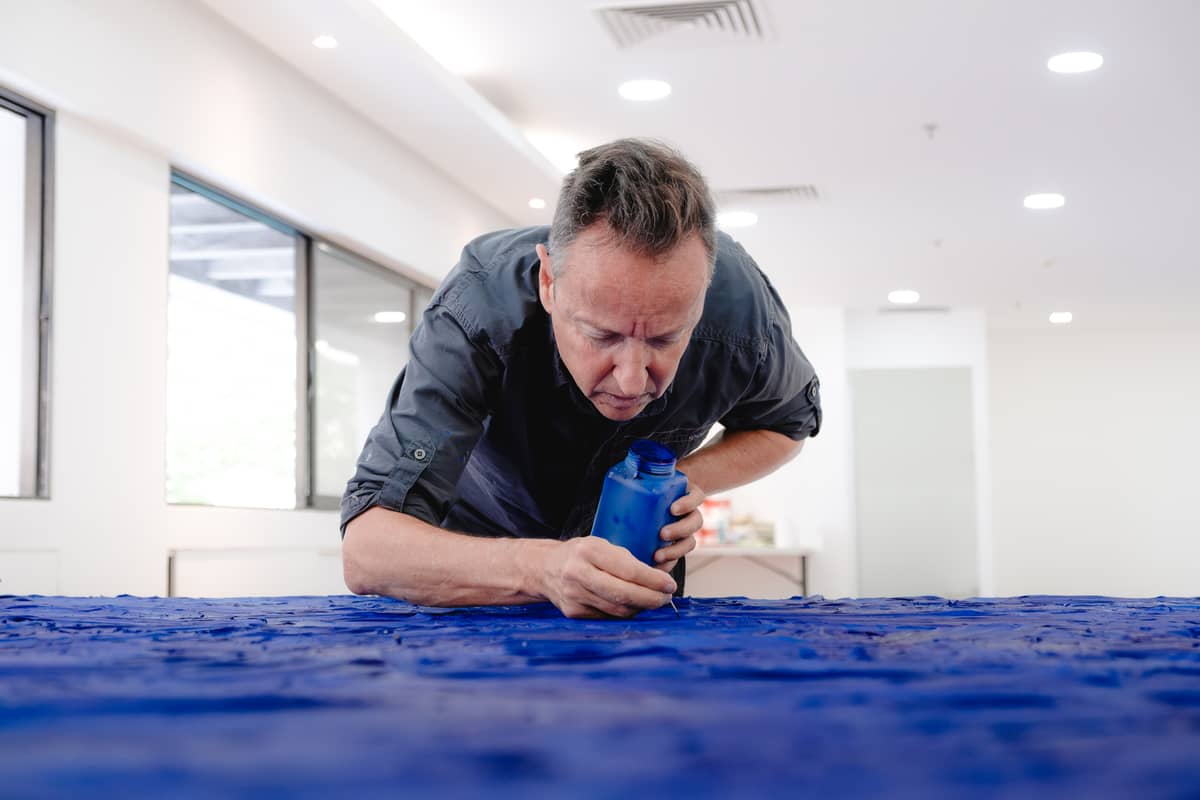 Joan Punyet Miro adds finishing details to his Manila obras.
