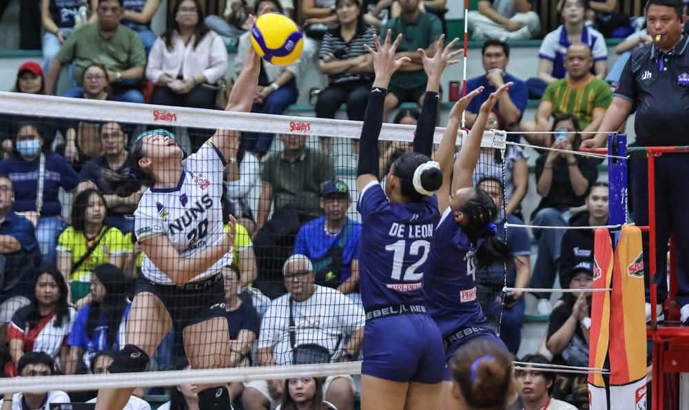 Tournament MVP Sam Cantada lends a big hand in helping NUNS get past Bacolod Tay Tung in the final of the SGVIL over the weekend.