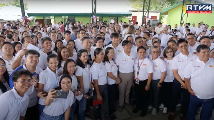 PRESIDENT Ferdinand Marcos Jr. poses for a photo with new public school teachers at the Tibagan Elementary School in San Miguel, Bulacan. Marcos said he considers teachers as 'heroes' going above and beyond their duties just to help their students.