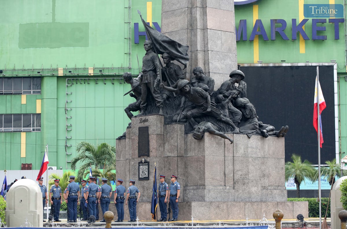 Members of the Northeastern Police District rehearse at the Andres Bonifacio Monument in Caloocan on Wednesday, 11 June 2025, ahead of the 127th Independence Day celebration.