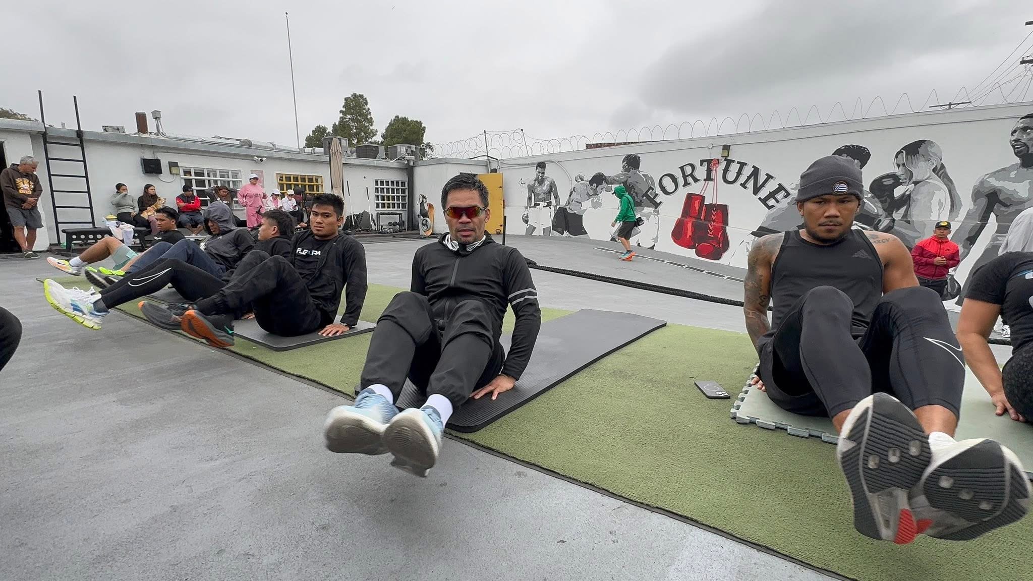 Pacquiao conducts rare boxing clinic
