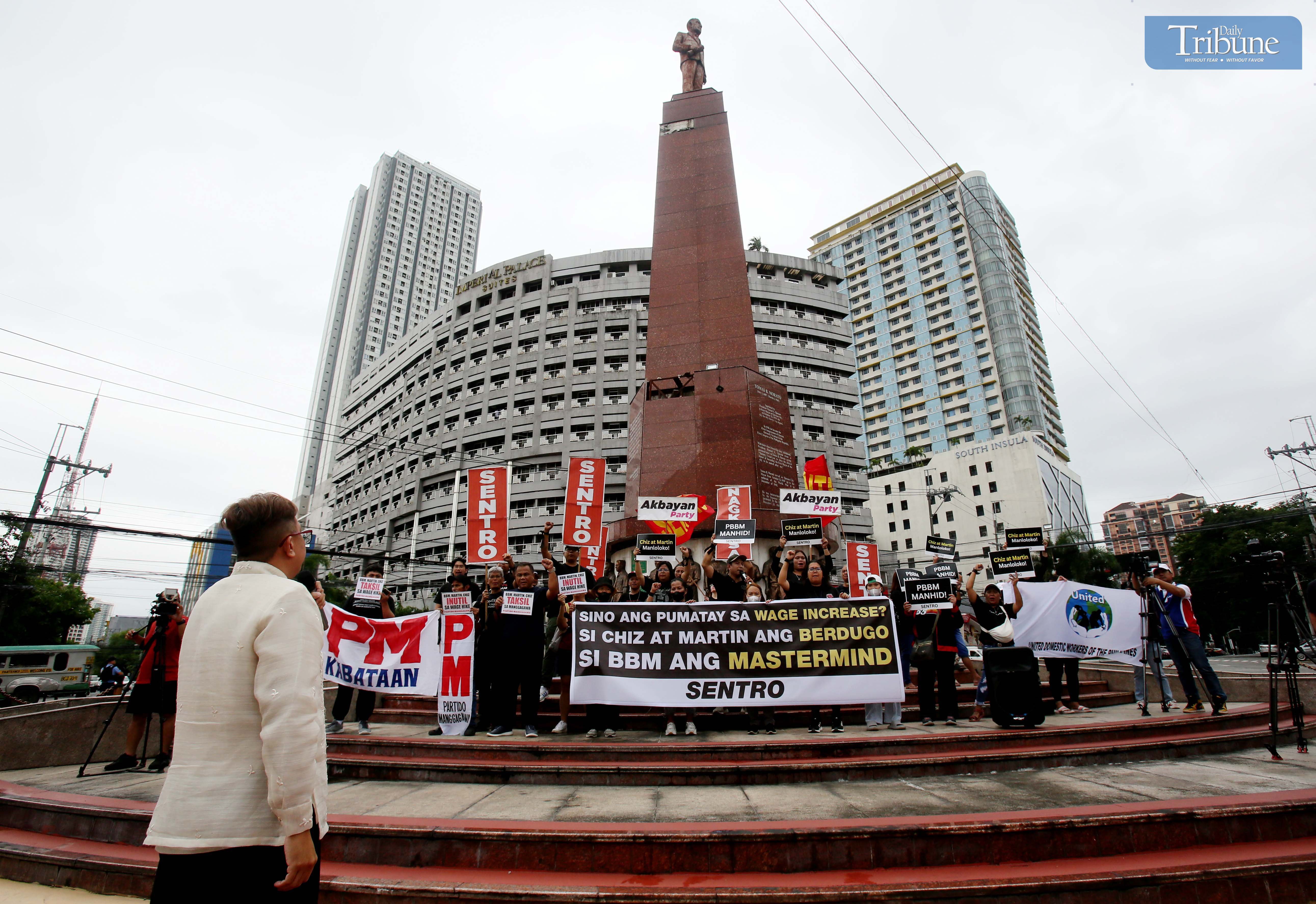 Protesters call key officials ‘traitors’ over uncertified wage hike bill