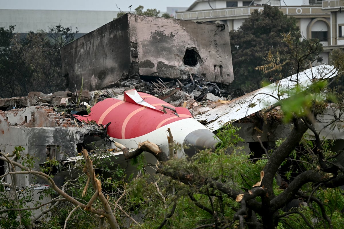 DEBRIS of Air India flight 171 is pictured after it crashed in a residential area near the airport in Ahmedabad.
