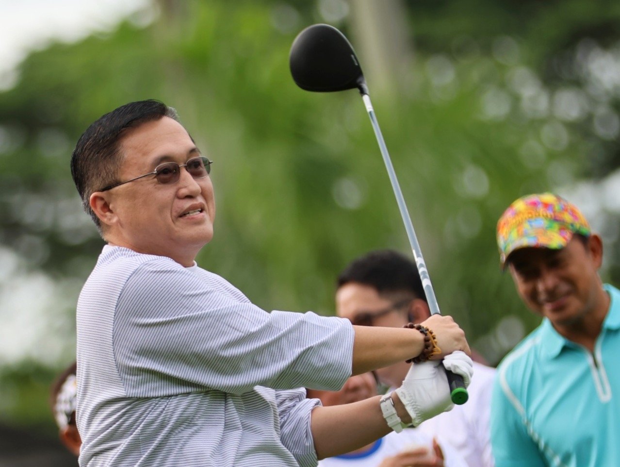 Swinging for young athletes and sports development with Senator Go
