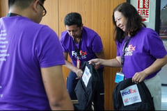 FedEx delivers hope, notebooks