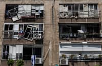 A DAMAGED building is pictured at a site in Tel Aviv hit by a missile fired from Iran on June 14, 2025. Israel's military said that its fighter jets were set to resume striking targets in Tehran, after announcing it had hit air defences in the Iranian capital area overnight, as Israel and Iran trade fire with such intensity for the first time following decades of enmity and conflict by proxy, with fears of a prolonged conflict engulfing the region.