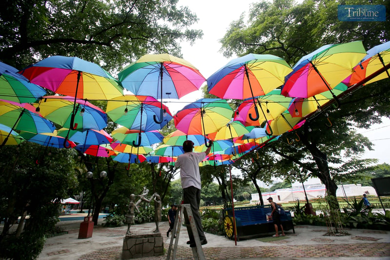 Pride umbrellas brighten QC Memorial Circle