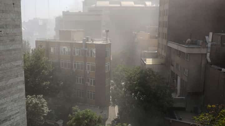 Smoke billows after a reported Israeli strike on Keshavarz Boulevard in downtown Tehran on June 15, 2025. Israel and Iran traded heavy fire for a third straight day on June 15, with mounting casualties and expanding targets marking a sharp escalation in hostilities between the longtime foes.