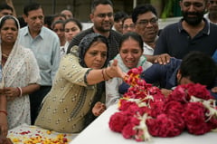 Families hold funerals for Air India crash victims