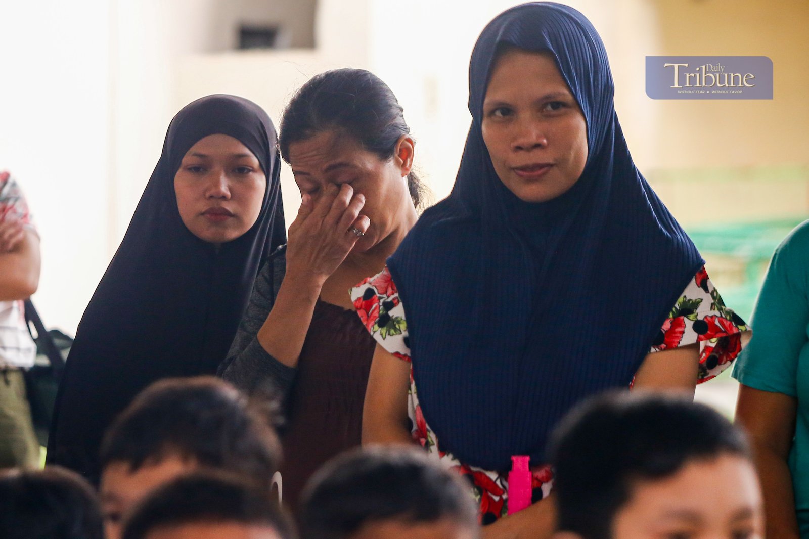 Parents accompany their children to a kindergarten school in Manila on Monday, 16 June 2025, marking the official start of the June-to-March academic year.