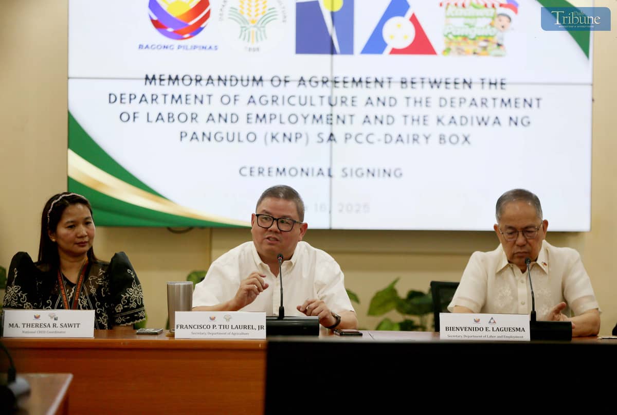AGRICULTURE Secretary Francisco Tiu Laurel Jr. and Labor Secretary Bienvenido Laguesma speak during the ceremonial signing of a memorandum of agreement between the Department of Agriculture and the Department of Labor and Employment at the Kadiwa ng Pangulo sa Dairy Box on 16 June 2025. The deal expands the P20 rice program of President Ferdinand Marcos Jr., aiming to ease the financial burden of low-income workers while boosting demand for locally produced rice. | Photo by Analy Labor