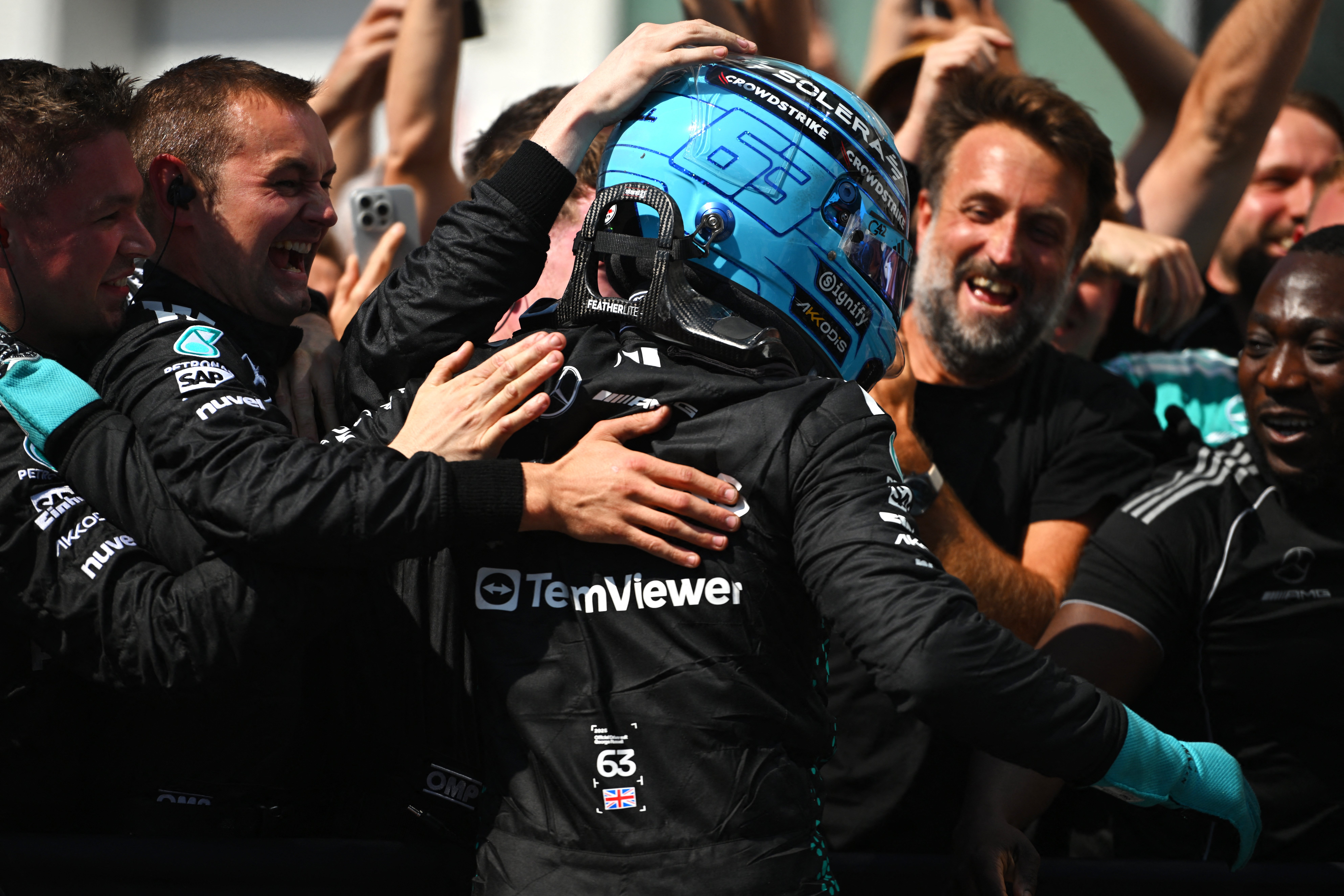 Russell triumphs in Canada as McLaren drivers crash