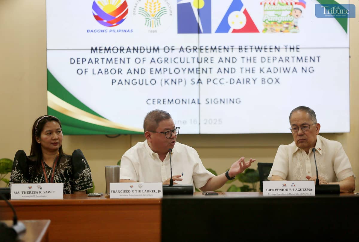 AGRICULTURE Secretary Francisco Tiu Laurel Jr. and Labor Secretary Bienvenido Laguesma speak during the ceremonial signing of a memorandum of agreement between the Department of Agriculture and the Department of Labor and Employment at the Kadiwa ng Pangulo sa Dairy Box on 16 June 2025. The deal expands the P20 rice program of President Ferdinand Marcos Jr., aiming to ease the financial burden of low-income workers while boosting demand for locally produced rice. | Photo by Analy Labor