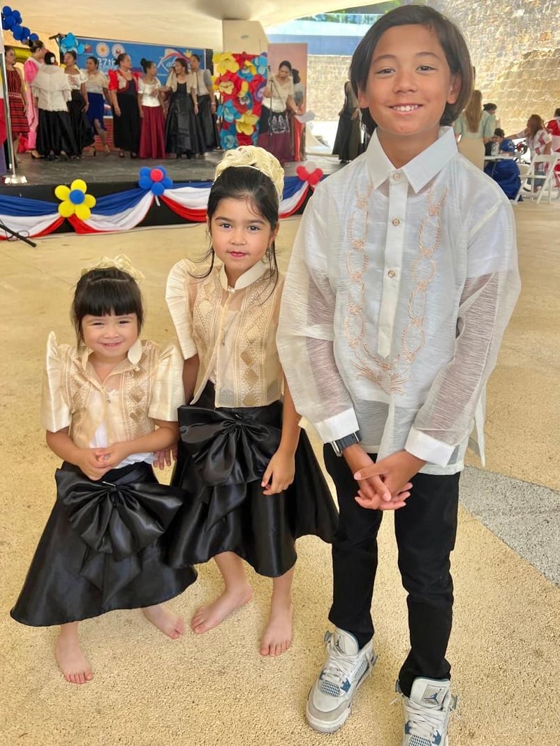 Proud Filipino children Evdokia, Margarita and Bullet Laconico.