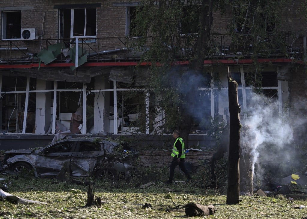 Russian strikes kill 14 in 'horrific' attack on Kyiv